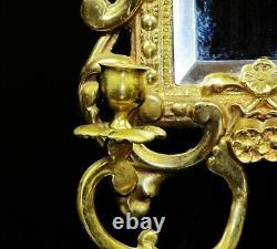 Pair of French wall sconces with 2 lights, in finely chiseled polish brass. 14X8