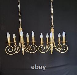 Pair of antique brass chandeliers